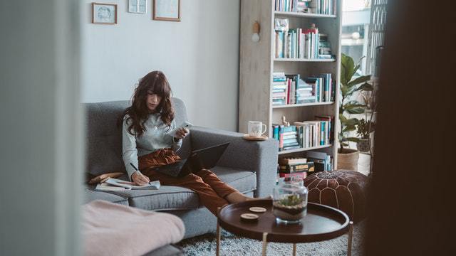 Woman_Writing_on_Couch