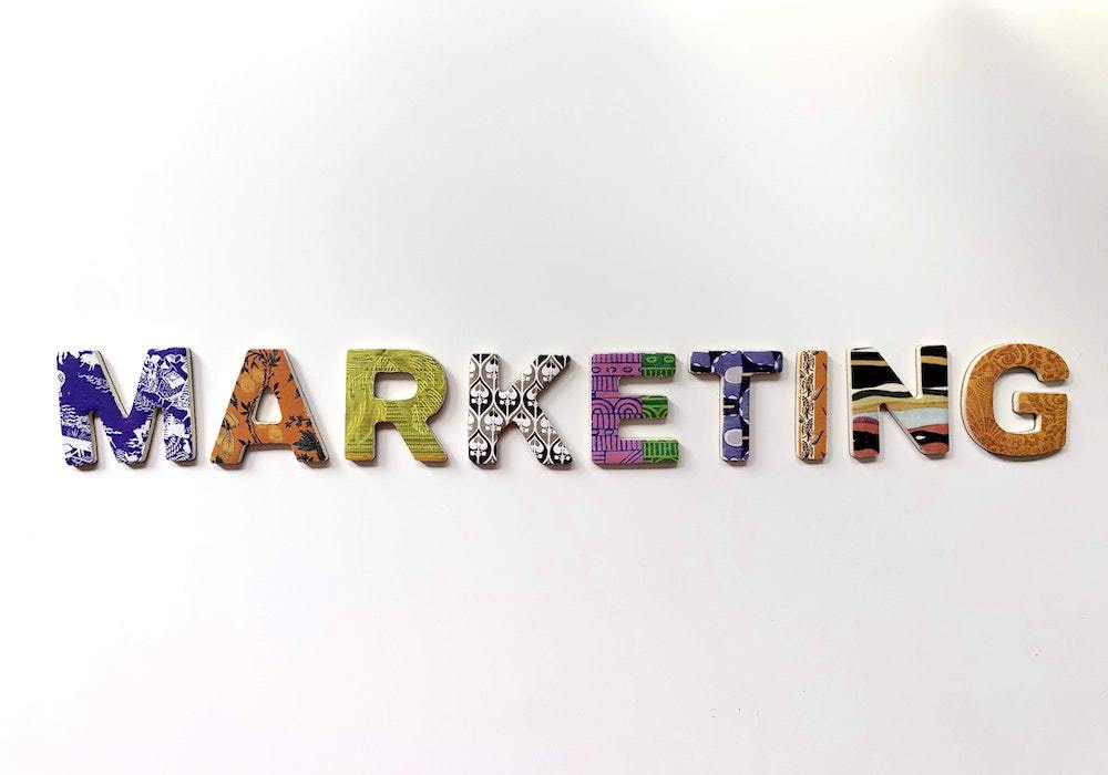 the word Marketing in colorful letters