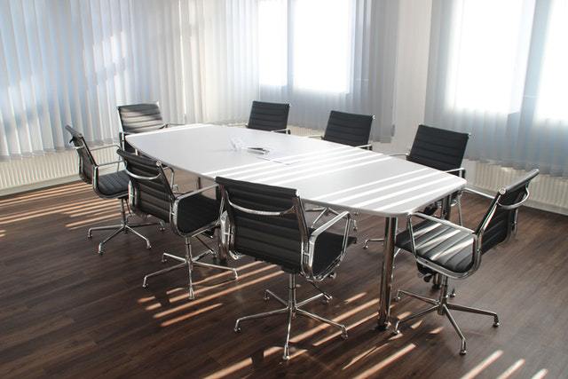 empty chairs around a conference table