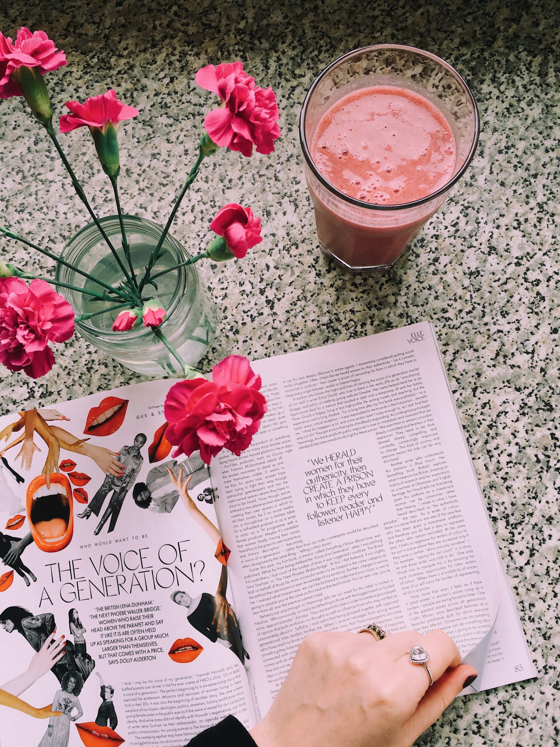 magazine with smoothie and flowers