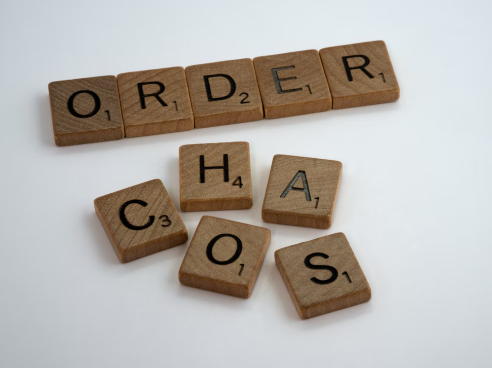 Scrabble tiles spelling Order and Chaos