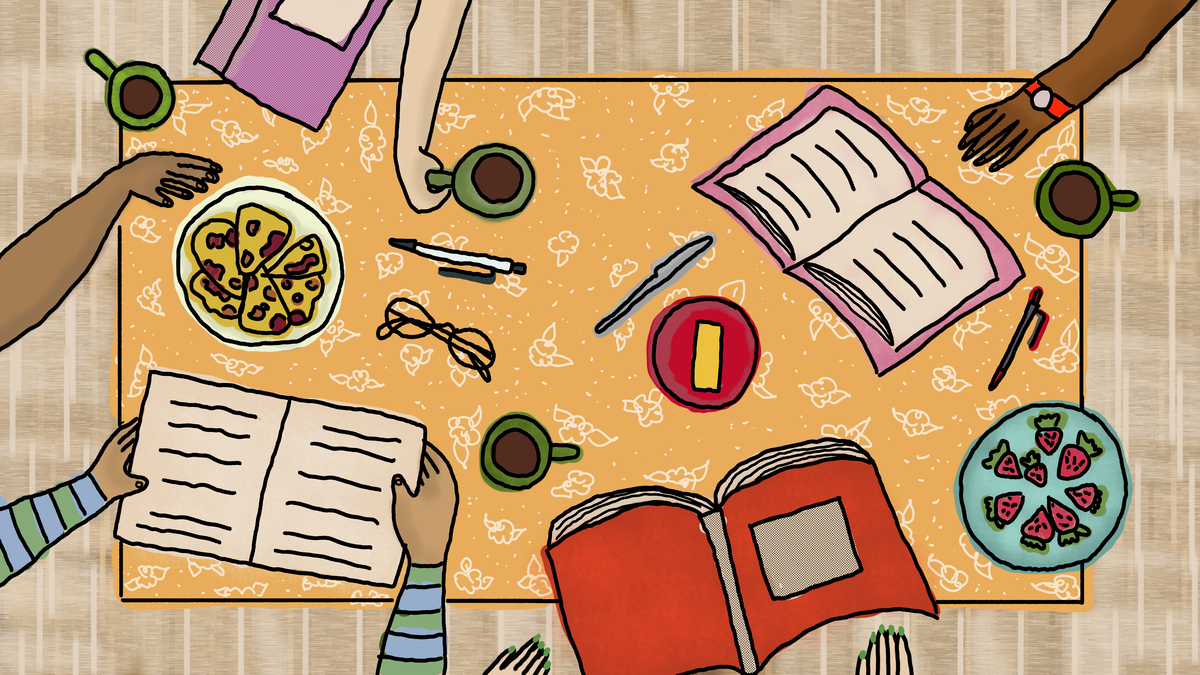 This image shows a table from a birds eye view with hands out on the table in collaboration. There are books, pencils, coffee, and food on the table.