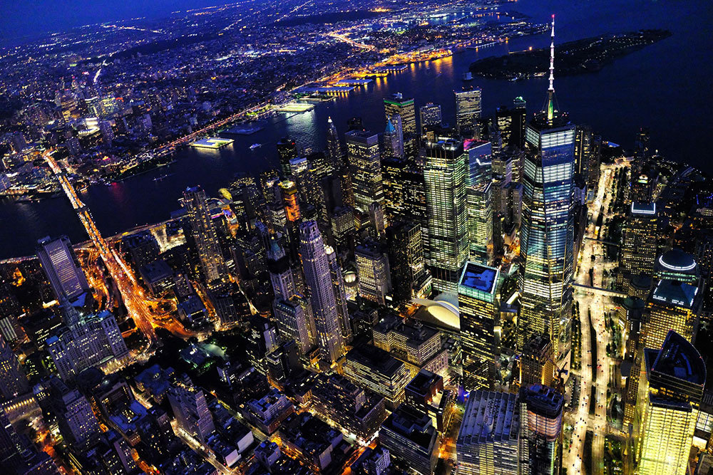 photograph of New York City from above the Empire State Building at night