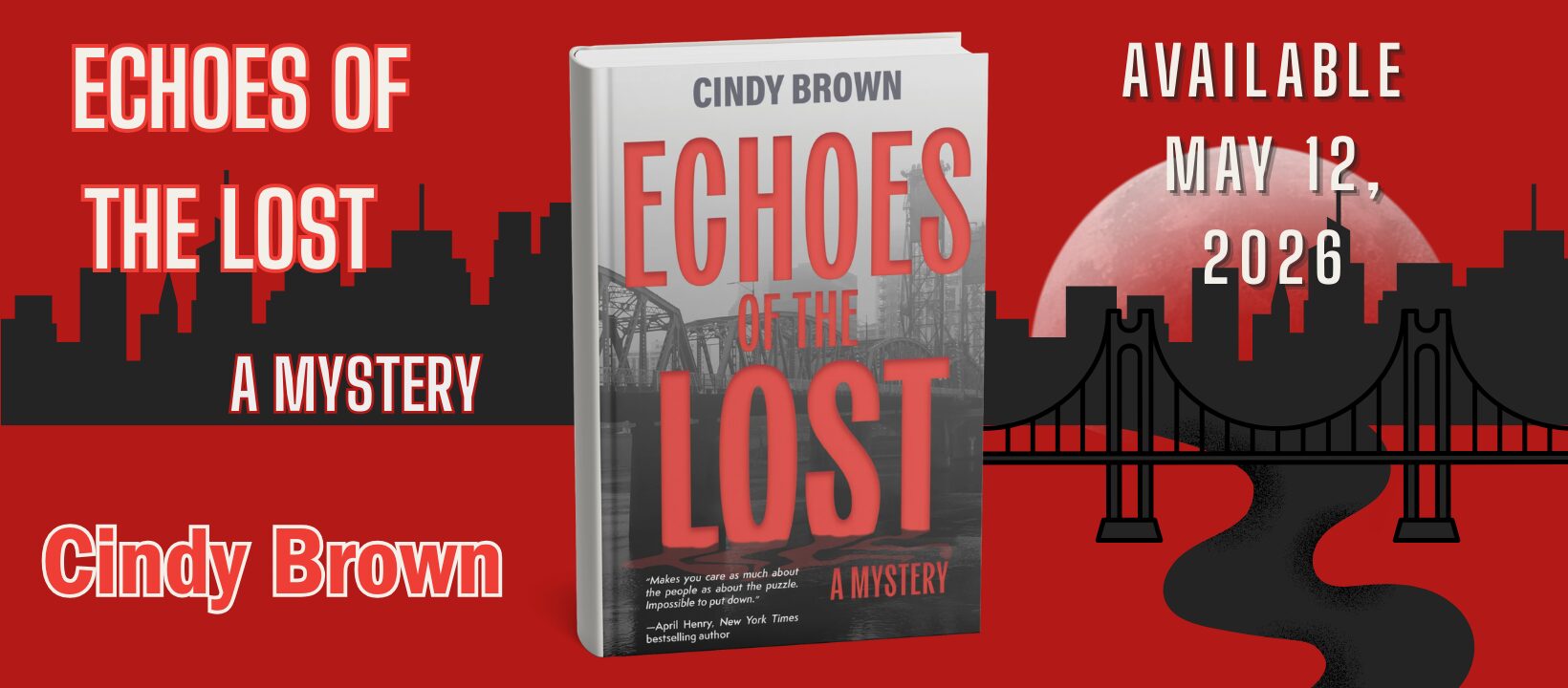 The book cover is front ad center, with a blacked out skyline in the background, against a red backdrop. On the left of the image the heading reads "ECHOES OF THE LOST, A MYSTERY" and "Cindy Brown" below that. On the right of the image a white moon looms over the skyline, with a river flowing toward the city from the skyline, a bridge hanging over that river as well. Text on the right reads "AVAILABLE MAY 12TH, 2026"